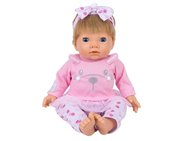 Tiny Treasures Doll with blonde hair and pink outfit