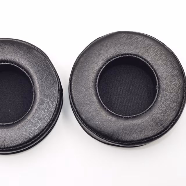 Erstatningsøreputer til JBL E50BT, myke saueskinnsøreputer til JBL S500 S700 hodetelefoner (2-pakning, svart)