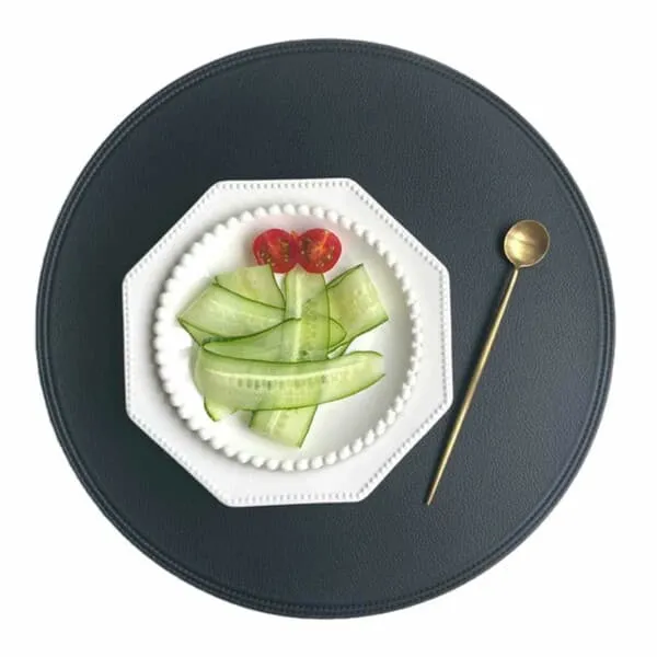 4-pack bordbrett i kunstig skinn rundt svart 38x38cm