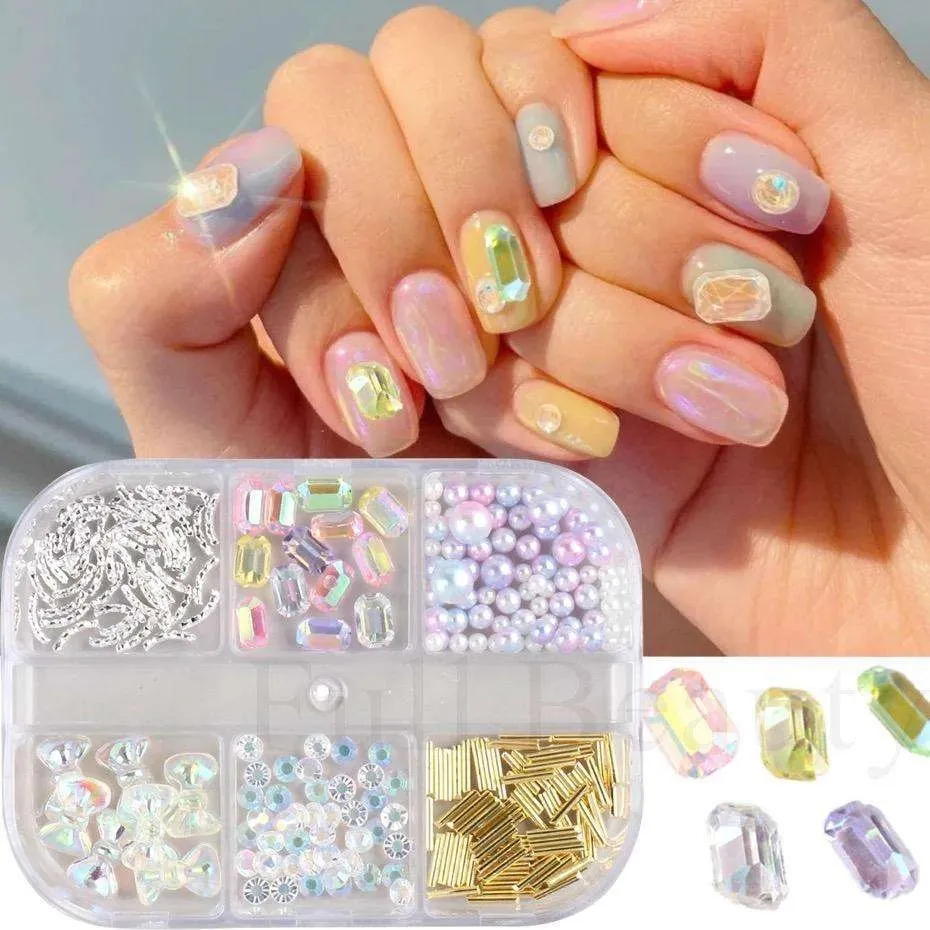 6 rhinestones i forskjellige størrelser i en boks - Negledekorasjoner