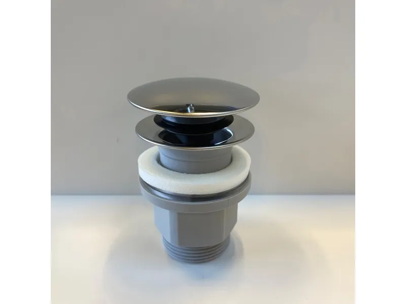 Ideal Standard 1 1/4 forkromet push open bundventil i plast med topcover i rustfrit stål